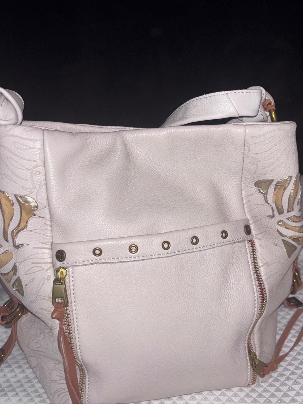 The Sak Cream Leather Shoulder Bag with Floral Cutout Accents
